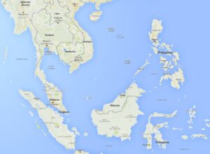 The image is a map of Southeast Asia, showing countries including Myanmar (Burma), Thailand, Laos, Vietnam, Cambodia, Malaysia, Singapore, Brunei, the Philippines, and Indonesia. Major cities such as Bangkok, Hanoi, Ho Chi Minh City, Kuala Lumpur, Manila, and Jakarta are labeled. The map also shows various bodies of water, including the South China Sea, Gulf of Thailand, Sulu Sea, Celebes Sea, and the Andaman Sea. Islands such as Hainan, Palawan, and the Spratly Islands are also visible.